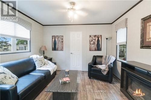 253 - 8845 Lundy'S Lane, Niagara Falls, ON - Indoor Photo Showing Living Room With Fireplace