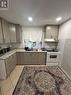 730 Queensdale Avenue E, Hamilton, ON  - Indoor Photo Showing Kitchen With Double Sink 