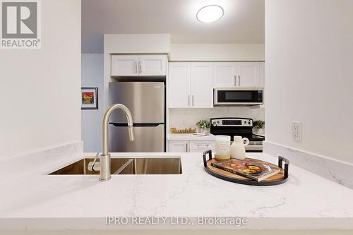 609 - 61 Heintzman Street, Toronto, ON - Indoor Photo Showing Kitchen With Double Sink