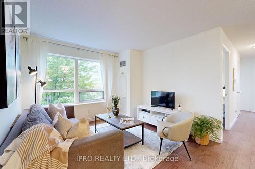 609 - 61 Heintzman Street, Toronto, ON - Indoor Photo Showing Living Room