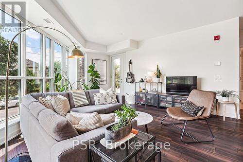 211 - 320 Plains Road E, Burlington, ON - Indoor Photo Showing Living Room