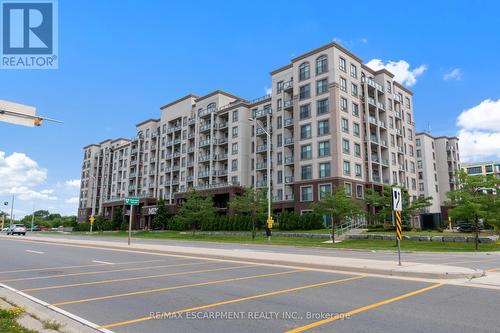 518 - 2490 Old Bronte Road, Oakville, ON - Outdoor With Balcony With Facade