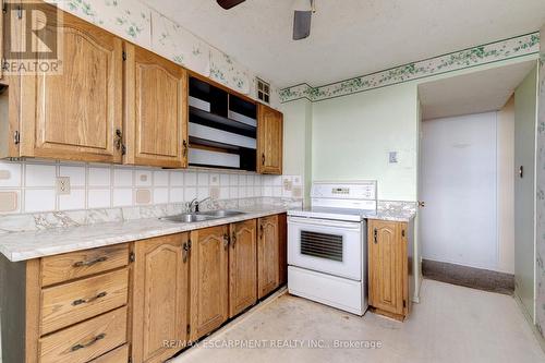 1214 - 700 Dynes Road, Burlington, ON - Indoor Photo Showing Kitchen With Double Sink