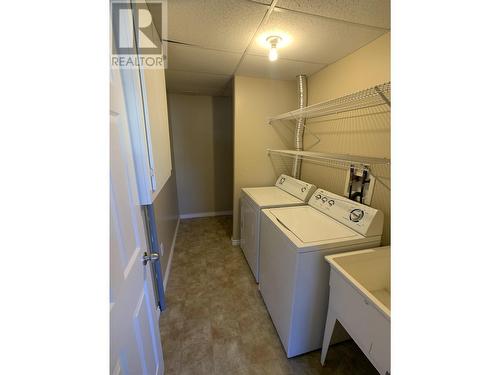 B 4609 Boundary Road, Fort Nelson, BC - Indoor Photo Showing Laundry Room