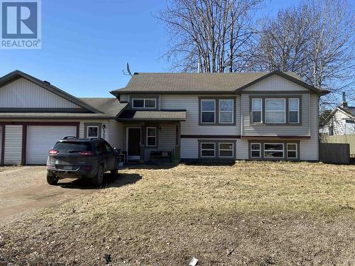 B 4609 Boundary Road, Fort Nelson, BC - Outdoor With Facade