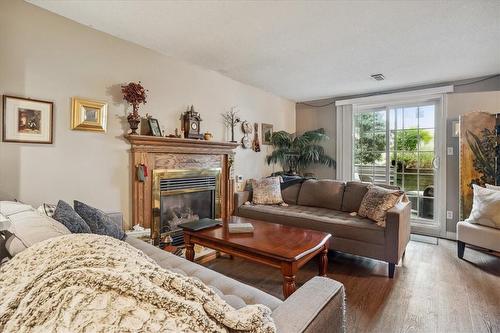 126 Gurnett Drive, Hamilton, ON - Indoor Photo Showing Living Room With Fireplace