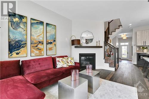 737 Maverick Crescent, Ottawa, ON - Indoor Photo Showing Living Room With Fireplace