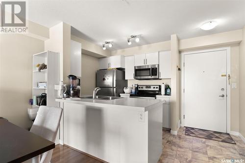 1205 5500 Mitchinson Way, Regina, SK - Indoor Photo Showing Kitchen With Double Sink