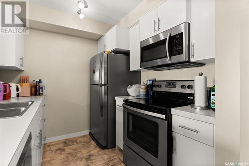 1205 5500 Mitchinson Way, Regina, SK - Indoor Photo Showing Kitchen With Double Sink