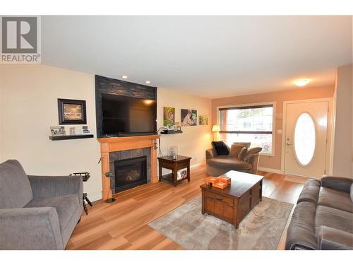 519 Loon Avenue, Vernon, BC - Indoor Photo Showing Living Room With Fireplace