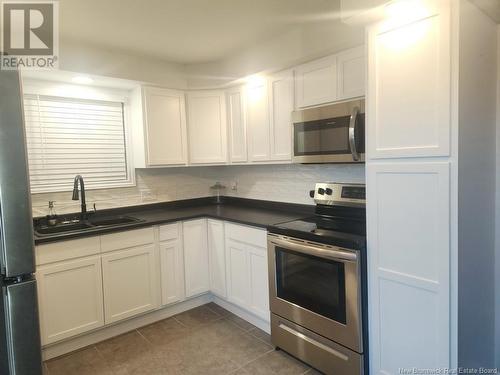 18 Martin Road, Sainte-Anne-De-Madawaska, NB - Indoor Photo Showing Kitchen With Double Sink