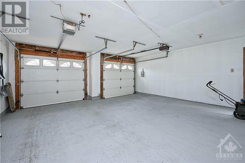 Garage - 38 Knudson Drive, Ottawa, ON - Indoor Photo Showing Garage