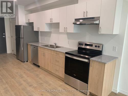 516 - 181 Elmira Road S, Guelph (West Willow Woods), ON - Indoor Photo Showing Kitchen With Stainless Steel Kitchen With Double Sink