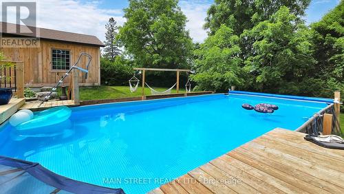 126 King Street, Kawartha Lakes (Woodville), ON - Outdoor With Above Ground Pool With Deck Patio Veranda With Backyard