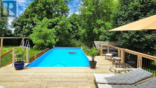 126 King Street, Kawartha Lakes (Woodville), ON - Outdoor With Above Ground Pool