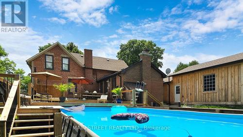 126 King Street, Kawartha Lakes (Woodville), ON - Outdoor With Above Ground Pool