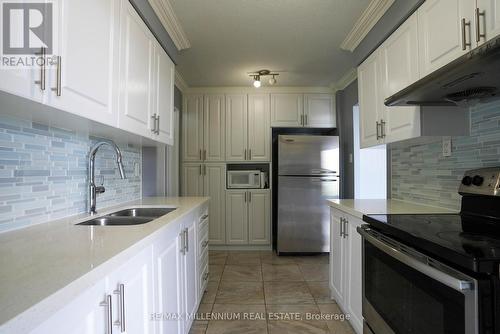 1604 - 3170 Kirwin Avenue, Mississauga, ON - Indoor Photo Showing Kitchen With Stainless Steel Kitchen With Double Sink With Upgraded Kitchen