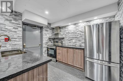 505 - 2901 Kipling Avenue, Toronto (Mount Olive-Silverstone-Jamestown), ON - Indoor Photo Showing Kitchen With Double Sink