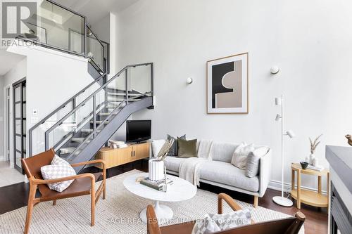 703 - 250 Manitoba Street, Toronto, ON - Indoor Photo Showing Living Room