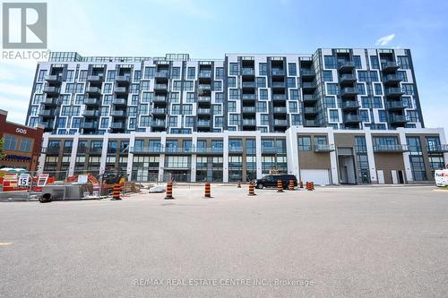 606 - 509 Dundas Street W, Oakville, ON - Outdoor With Facade