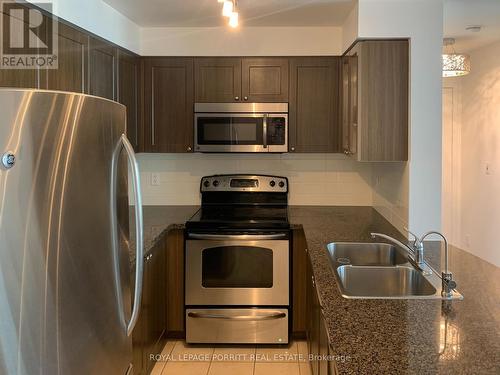 1701 - 4900 Glen Erin Drive, Mississauga (Central Erin Mills), ON - Indoor Photo Showing Kitchen With Double Sink With Upgraded Kitchen