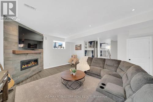 80 Allegra Drive, Wasaga Beach, ON - Indoor Photo Showing Living Room With Fireplace