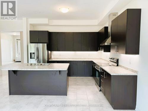 51 Sanford Circle, Springwater (Centre Vespra), ON - Indoor Photo Showing Kitchen With Double Sink With Upgraded Kitchen