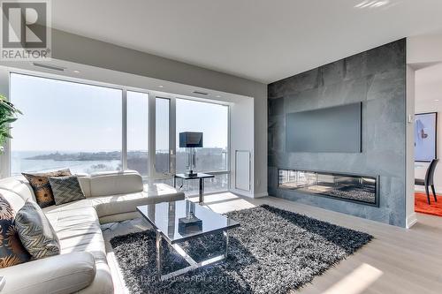 1002 - 90 Stadium Road, Toronto C01, ON - Indoor Photo Showing Living Room With Fireplace