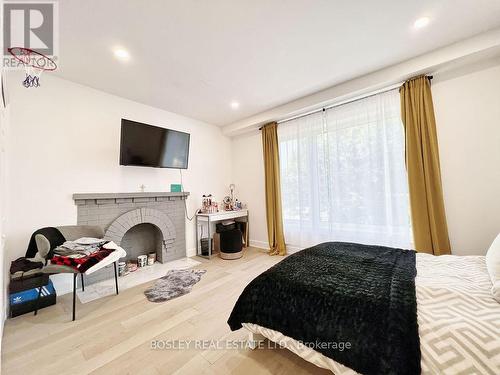 629 Shaw Street, Toronto, ON - Indoor Photo Showing Bedroom With Fireplace