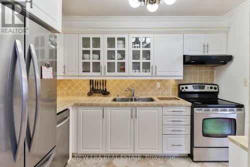 Ph5 - 5 Shady Golfway, Toronto, ON - Indoor Photo Showing Kitchen With Double Sink