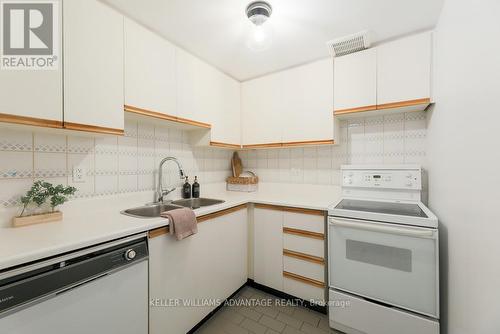 303 - 61 Main Street, Toronto, ON - Indoor Photo Showing Kitchen With Double Sink