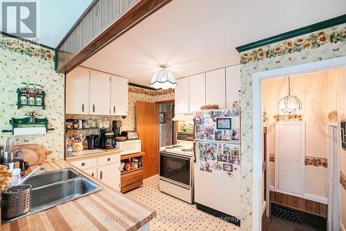 793 Kenstone Beach Road, Kawartha Lakes (Bobcaygeon), ON - Indoor Photo Showing Kitchen With Double Sink