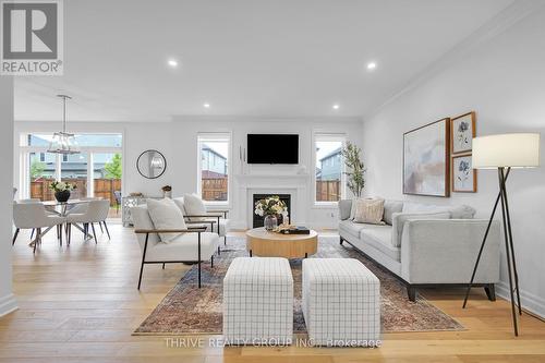 1345 Silverfox Drive, London, ON - Indoor Photo Showing Living Room With Fireplace