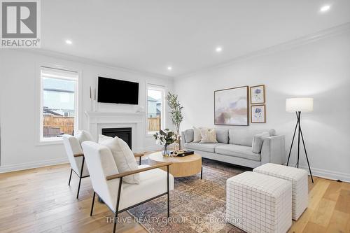 1345 Silverfox Drive, London, ON - Indoor Photo Showing Living Room With Fireplace