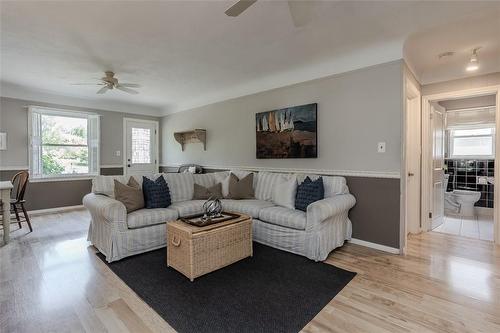 Direct entry to garage. - 674 Holt Drive, Burlington, ON - Indoor Photo Showing Living Room