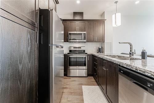 101 Locke Street S|Unit #305, Hamilton, ON - Indoor Photo Showing Kitchen With Double Sink With Upgraded Kitchen