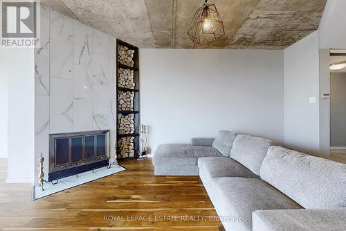 Ph 8 - 701 King Street W, Toronto C01, ON - Indoor Photo Showing Living Room With Fireplace