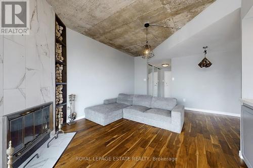 Ph 8 - 701 King Street W, Toronto C01, ON - Indoor Photo Showing Living Room With Fireplace