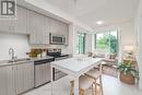 315 - 68 Merton Street, Toronto C10, ON  - Indoor Photo Showing Kitchen With Double Sink 