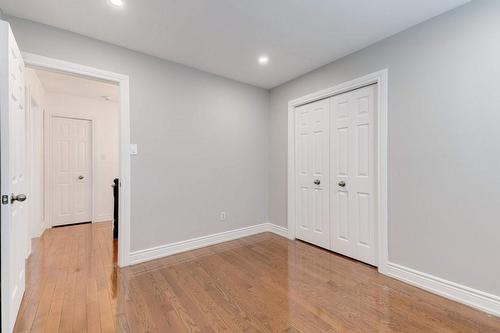 Bedroom 2 w/hardwood & LED Potlights - 2182 Maplewood Drive, Burlington, ON - Indoor Photo Showing Other Room