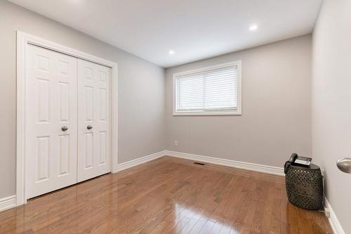 Bedroom 2 overlooks Back yard. - 2182 Maplewood Drive, Burlington, ON - Indoor Photo Showing Other Room