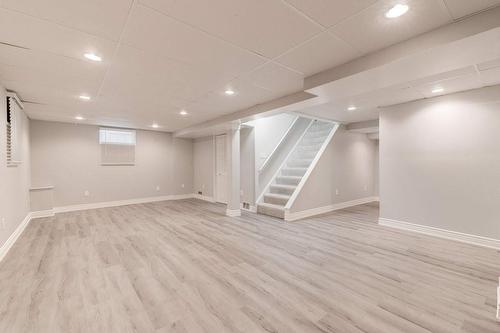 Bright Recroom w/newer vinyl wood plank floors 2023 - 2182 Maplewood Drive, Burlington, ON - Indoor Photo Showing Other Room