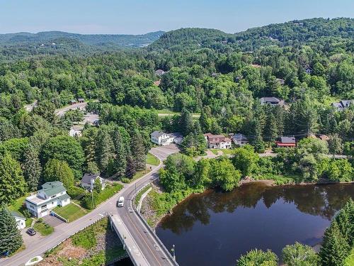 Photo aÃ©rienne - 136Z Ch. De La Gare, Piedmont, QC - Outdoor With Body Of Water With View