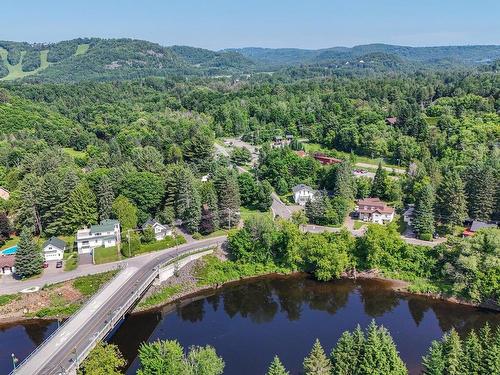 Photo aÃ©rienne - 136Z Ch. De La Gare, Piedmont, QC - Outdoor With Body Of Water With View