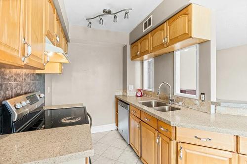 101 Queen Street S|Unit #404, Hamilton, ON - Indoor Photo Showing Kitchen With Double Sink
