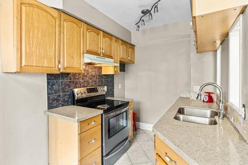 101 Queen Street S|Unit #404, Hamilton, ON - Indoor Photo Showing Kitchen With Double Sink