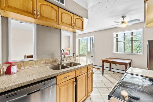 101 Queen Street S|Unit #404, Hamilton, ON - Indoor Photo Showing Kitchen With Double Sink