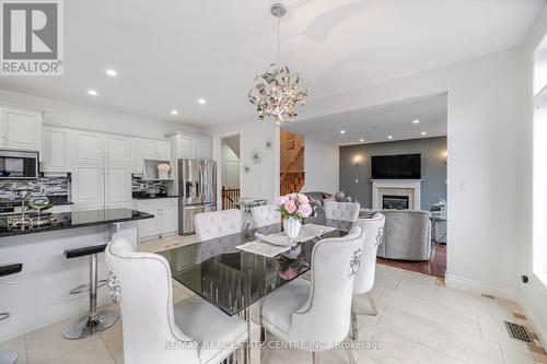 72 Southcreek Drive, Hamilton, ON - Indoor Photo Showing Dining Room With Fireplace