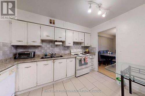 1210 - 80 Inverlochy Boulevard, Markham (Royal Orchard), ON - Indoor Photo Showing Kitchen With Double Sink