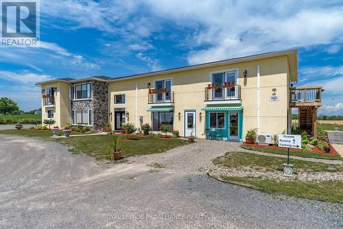 598 Swamp College Road, Prince Edward County (Hillier), ON - Outdoor With Balcony With Facade